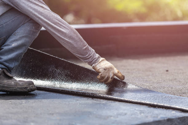 Professional Basement Waterproofing technician working in Round Hill, VA